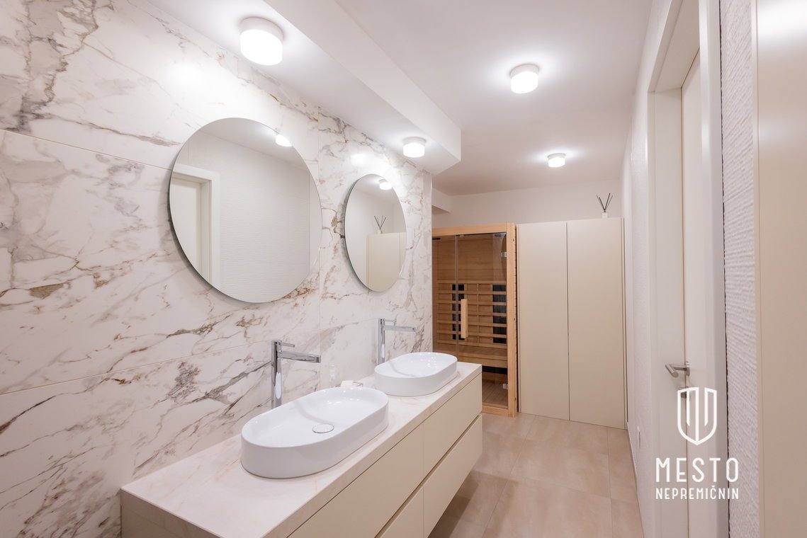 Modern designer two-bedroom duplex apartment with an atrium – Črnuče – 24