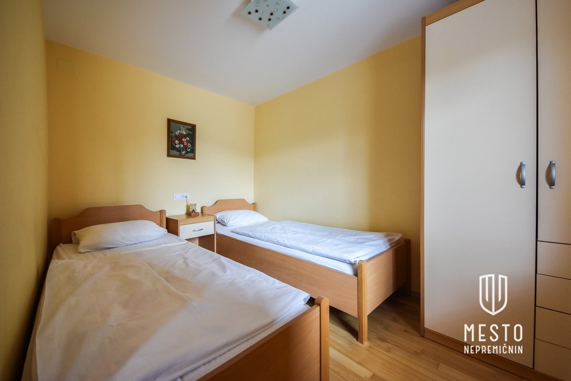 Two apartment houses with 15 apartments in Bohinj – 12